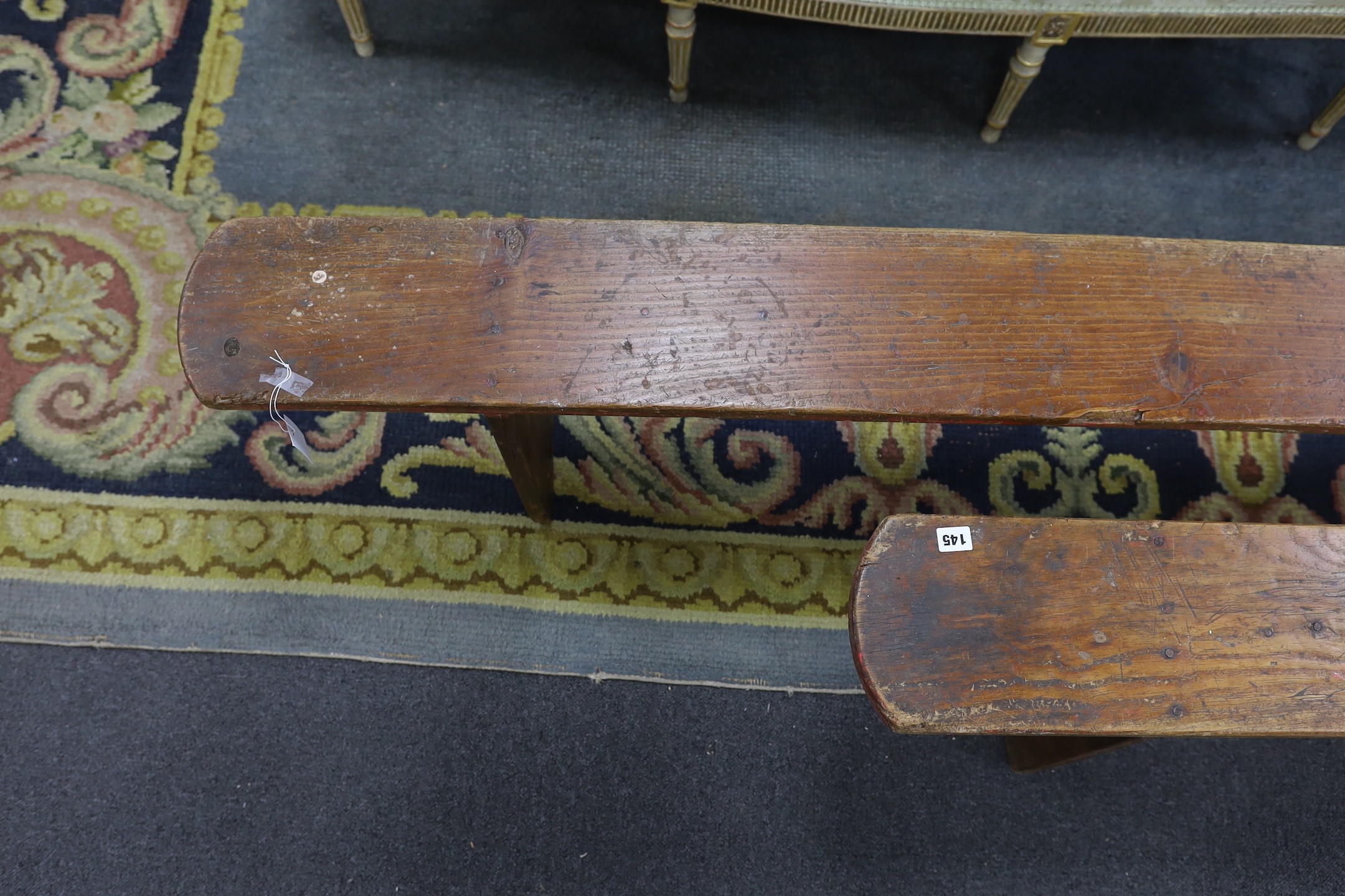 A pair of 19th century provincial elm bench seats, length 199cm, height 46cm